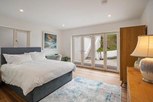 Ένα ή περισσότερα κρεβάτια σε δωμάτιο στο Herons Nest