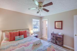 a bedroom with a bed and a ceiling fan at Tracy City Home Near South Cumberland State Park! in Monteagle