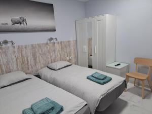 Voodi või voodid majutusasutuse Casa Tartago toas