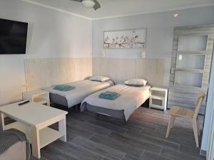 Voodi või voodid majutusasutuse Casa Tartago toas