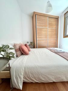 Ένα ή περισσότερα κρεβάτια σε δωμάτιο στο Apartamento Enseñanza - Kid Friendly
