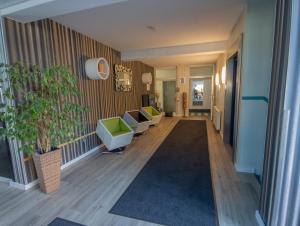 Posezení v ubytování Check Inn Hotel Merseburg