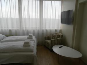 Hotel Madl客房内的一张或多张床位