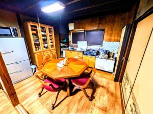 Kuchyň nebo kuchyňský kout v ubytování ゲストハウス 汀 Guesthouse NAGISA