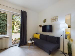 TV/trung tâm giải trí tại Studios with Parking and Garden near Warsaw Chopin Airport by Noclegi Renters