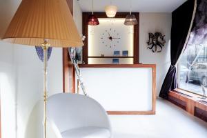 Posteľ alebo postele v izbe v ubytovaní Myo Hotel Mysterius