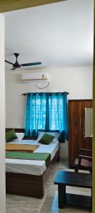 Φωτογραφία από το άλμπουμ του Megha Lodging σε Chik Bānavar