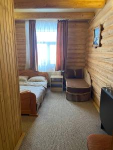 Postel nebo postele na pokoji v ubytování Шепіт Карпат + 37 fotografií