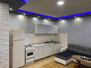 Kuchyň nebo kuchyňský kout v ubytování Crystal Apartman Obrenovac + 12 fotografií