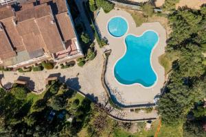 The swimming pool at or close to ILIA'S House Porto Rotondo