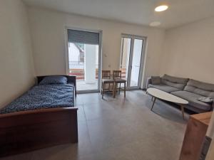 Ένα ή περισσότερα κρεβάτια σε δωμάτιο στο Komfortneubauwohnung Braunsbach