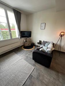 TV a/nebo společenská místnost v ubytování Casa di Alex