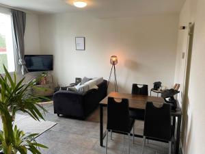 TV a/nebo společenská místnost v ubytování Casa di Alex + 2 fotografie