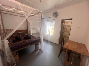 Galería fotográfica de The Drop In Madiha I Double Bedroom with private Bathroom en Madihe East