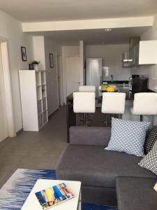 A kitchen or kitchenette at MOGAN PEARL - POOL - DOUBLE TERRACE - OCEAN VIEW - BEACH - WIFI - WONDERFUL Complex - FREE DIGITAL TRAVEL GUIDE