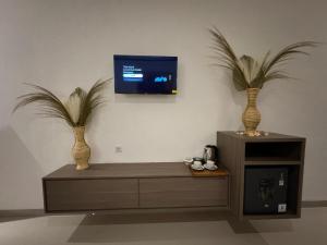 TV a/nebo společenská místnost v ubytování Kelingking Parama Resort