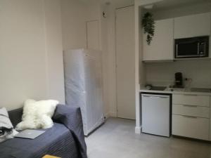 Kuchyňa alebo kuchynka v ubytovaní Charmant studio au coeur de Paris