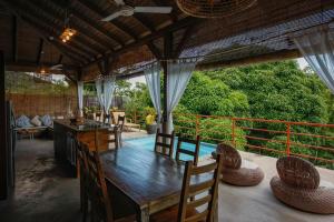 Imagem da galeria de La Pointe Beach Huts em Praslin
