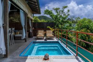 Imagem da galeria de La Pointe Beach Huts em Praslin