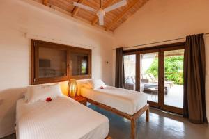 Imagem da galeria de La Pointe Beach Huts em Praslin