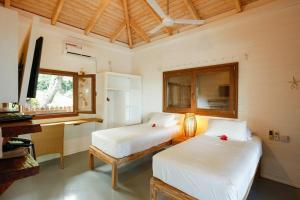 Imagem da galeria de La Pointe Beach Huts em Praslin