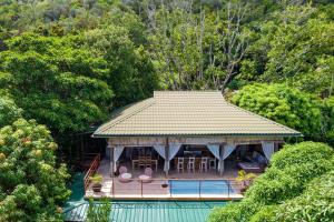 Imagem da galeria de La Pointe Beach Huts em Praslin