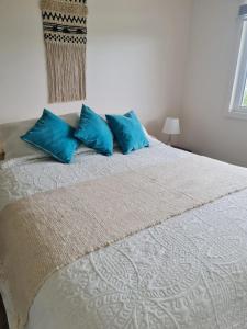 Postel nebo postele na pokoji v ubytování departamento en condominio Puerto montt