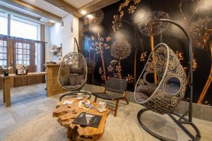 Posezení v ubytování CGH Résidence Boutique Le Lodge des Neiges