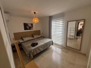 Voodi või voodid majutusasutuse penthouse with great sea view and natural reserve - magnificent swimming pool - calm and bright toas