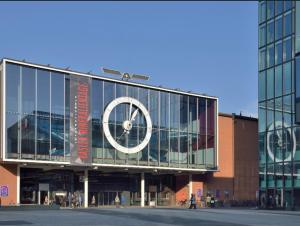 a building with a large sign on the side of it at Apartment Basel in Basel