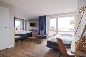Postel nebo postele na pokoji v ubytování Siel59 Hotel & Restaurant