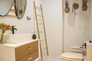 Koupelna v ubytování Apartamento Naranja + 35 fotografií