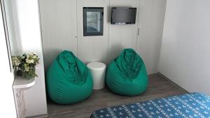 TV a/nebo společenská místnost v ubytování Hotel Sorriso - molto più di una stella