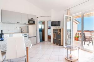 Kuchyňa alebo kuchynka v ubytovaní Apartments Malenica