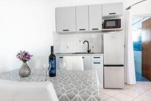 Kuchyňa alebo kuchynka v ubytovaní Apartments Malenica