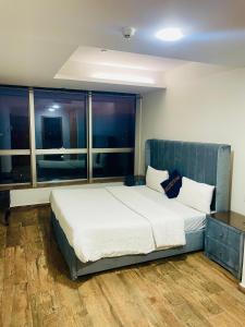 En eller flere senge i et værelse på Centaurus Apartment + 11 billeder