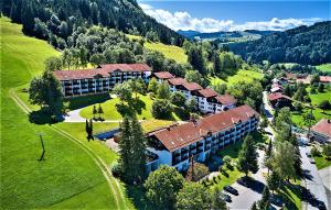 an aerial view of a building with a resort at Ferienwohnung Oberallgäu Ferienpark mit Schwimmbad in Missen-Wilhams