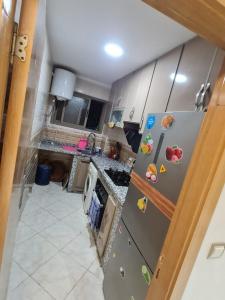 Η κουζίνα ή μικρή κουζίνα στο Appartement perle de bouznika