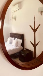Ένα ή περισσότερα κρεβάτια σε δωμάτιο στο Elysian home villa
