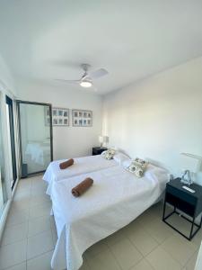 Postel nebo postele na pokoji v ubytování Villa Hélice - Apartamento con piscina, terraza y pádel en Cabo de Gata