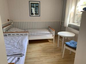 Postel nebo postele na pokoji v ubytování Pilars Fischwerk