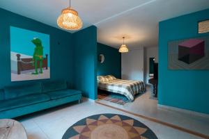 Postel nebo postele na pokoji v ubytování Loft in the heart of laureles