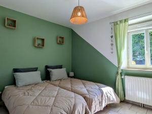 Katil atau katil-katil dalam bilik di Maison plain pied avec jardin clos à Longchamps - FR-1-585-137