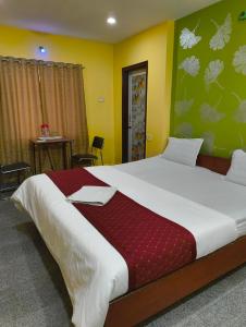 Postel nebo postele na pokoji v ubytování Hotel Swagat