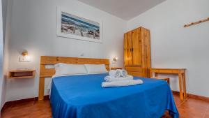 Postel nebo postele na pokoji v ubytování La Tortuga Lodging Rooms