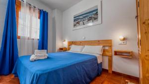 Postel nebo postele na pokoji v ubytování La Tortuga Lodging Rooms