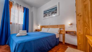 Postel nebo postele na pokoji v ubytování La Tortuga Lodging Rooms