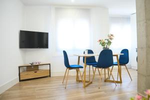 TV a/nebo společenská místnost v ubytování 1 planta A Apartamentos Juan Robledo Centro Ciudad