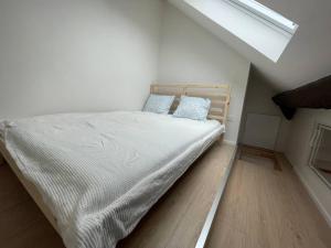 Posteľ alebo postele v izbe v ubytovaní Hotel Vinařice Česky kras