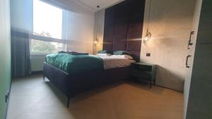Postel nebo postele na pokoji v ubytování Apartament LOFT
